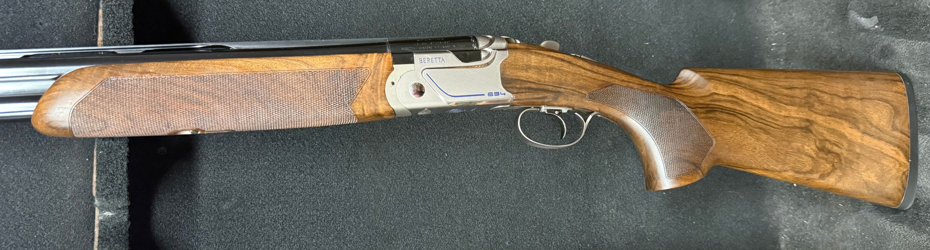 694 Sporting 12 gauge 32